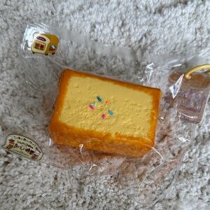 Taba squishy toy (Yellow Orange Dessert Squishy)